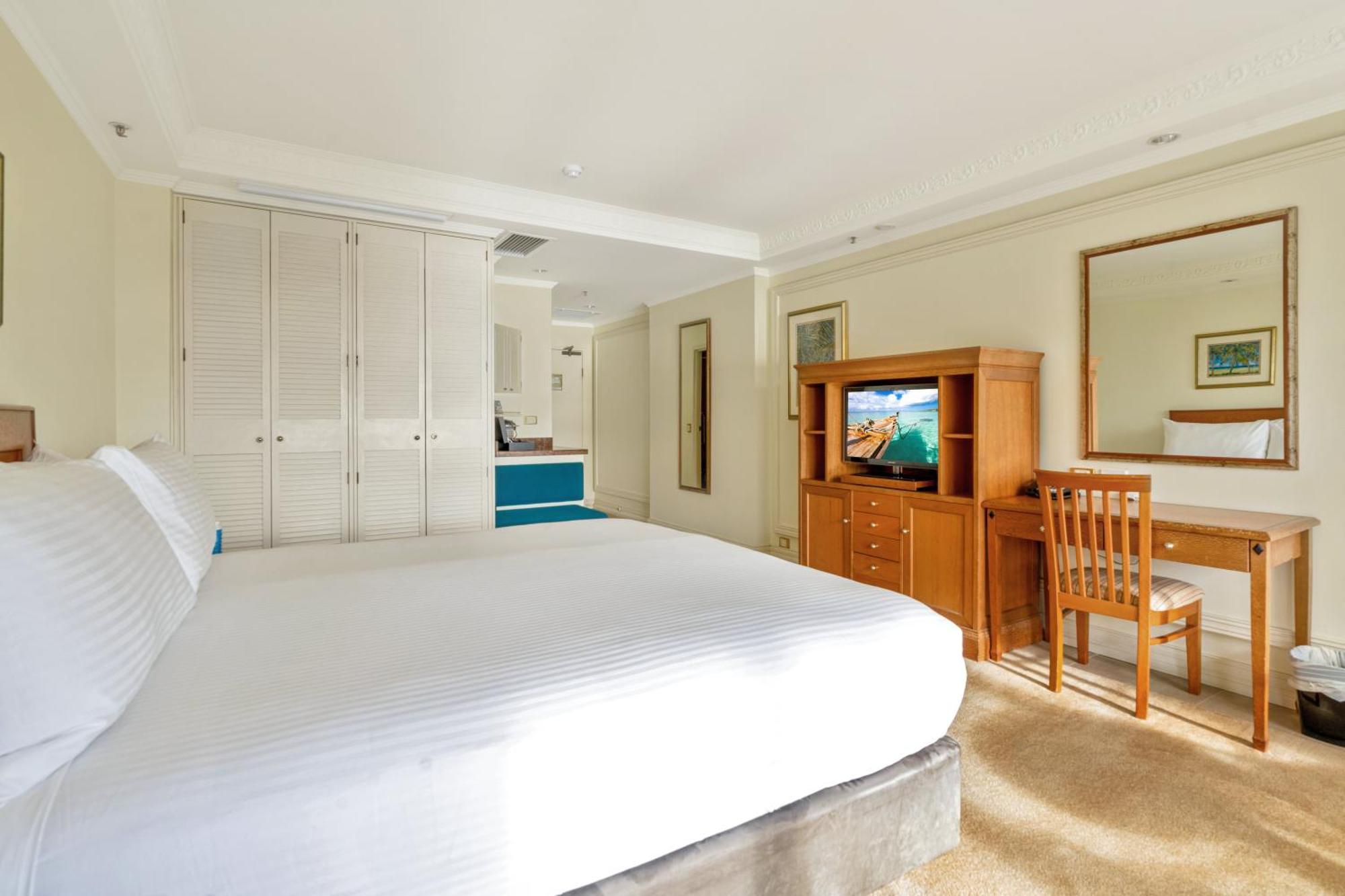מלון Pullman Cairns International מראה חיצוני תמונה A bedroom at the Grand Hotel