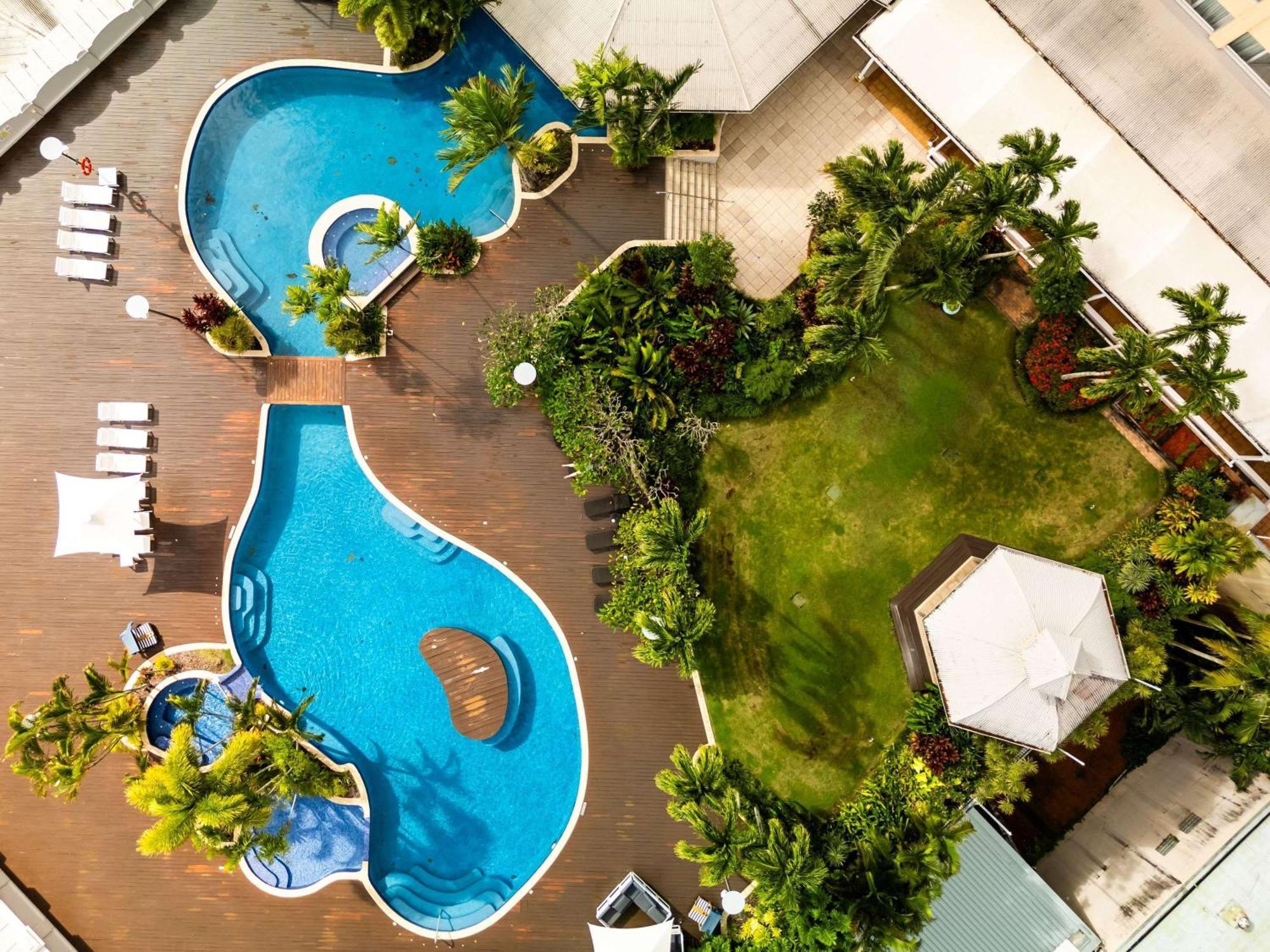 מלון Pullman Cairns International מראה חיצוני תמונה The swimming pool at the hotel